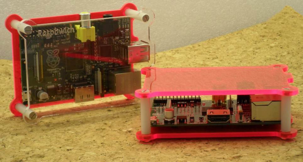 A photograph of two fluorescent Raspbwiches